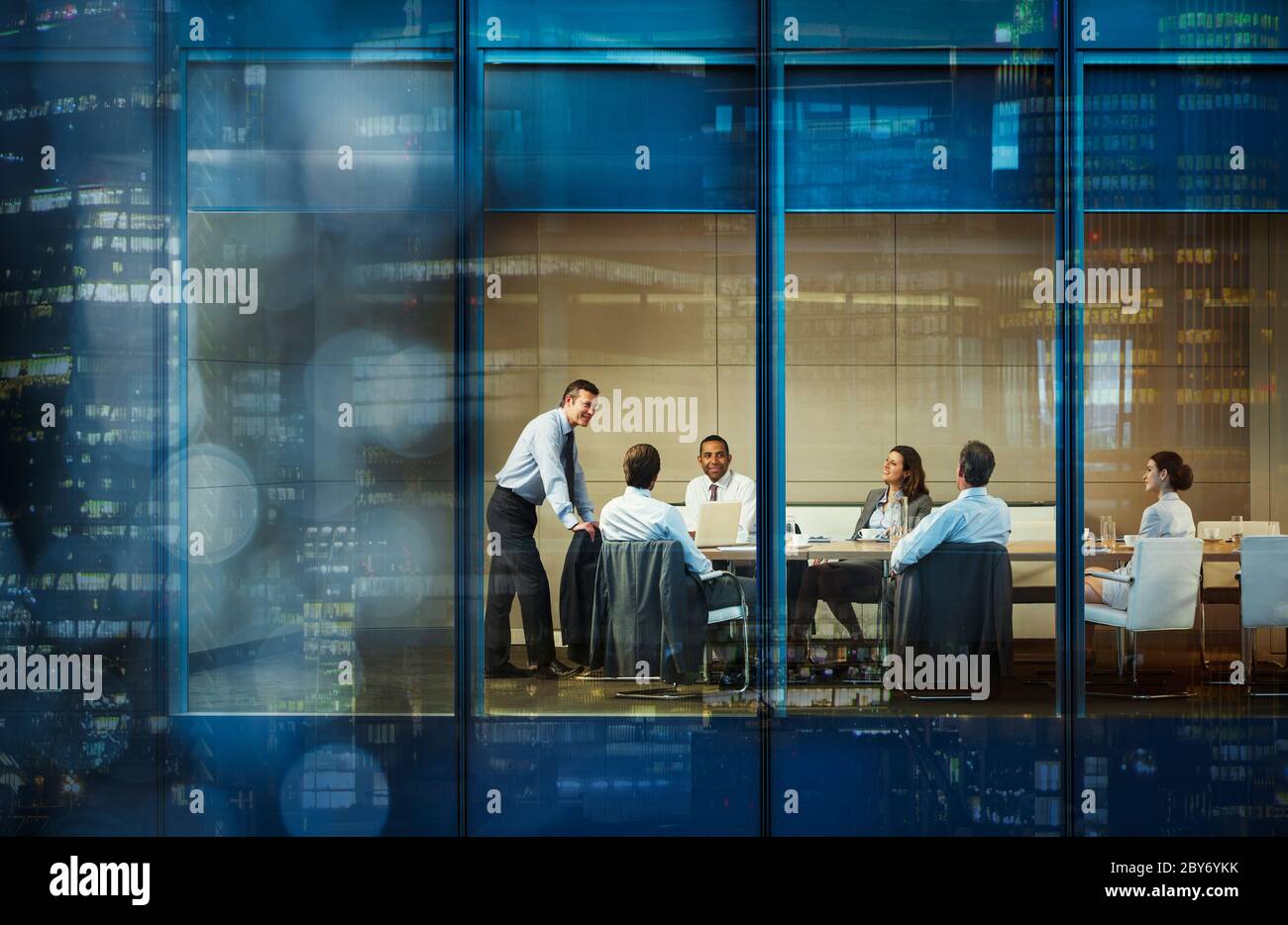 Corporate business people meeting in highrise conference room Stock Photo