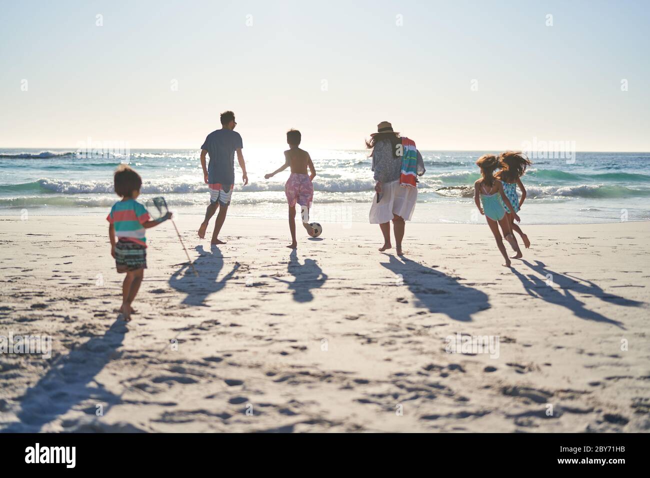 Couple Playing Beach Ball High Resolution Stock Photography and Images ...
