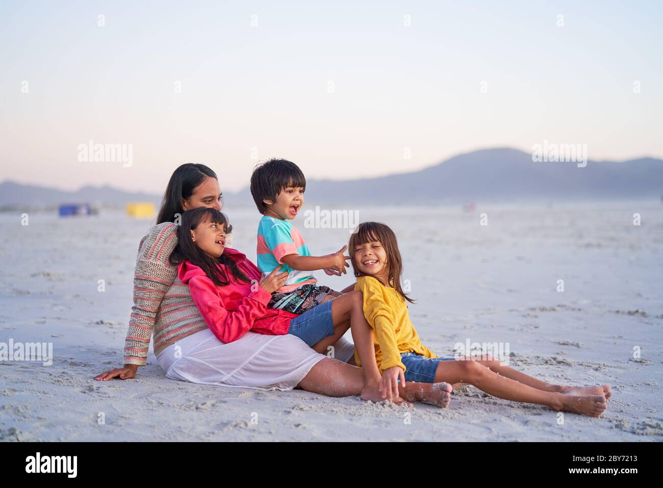 Day at the beach with family hi-res stock photography and images - Alamy