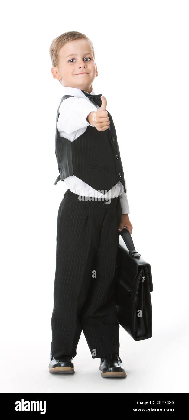 Boy holding a briefcase isolated on white background Stock Photo Alamy