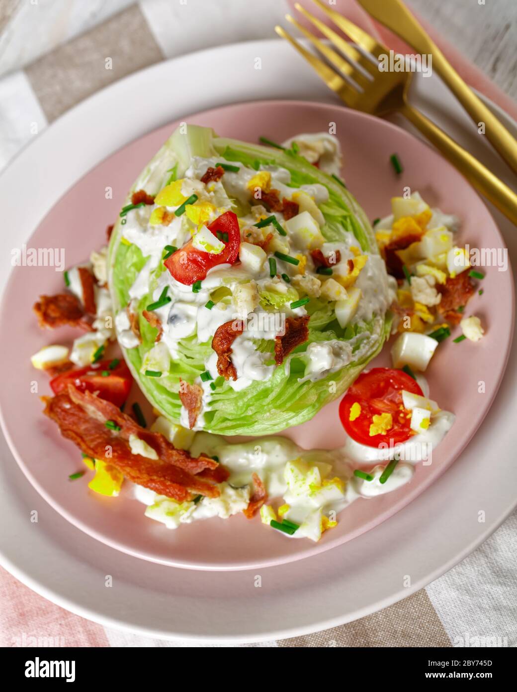 iceberg wedge salad with blue cheese dressing, crispy fried bacon