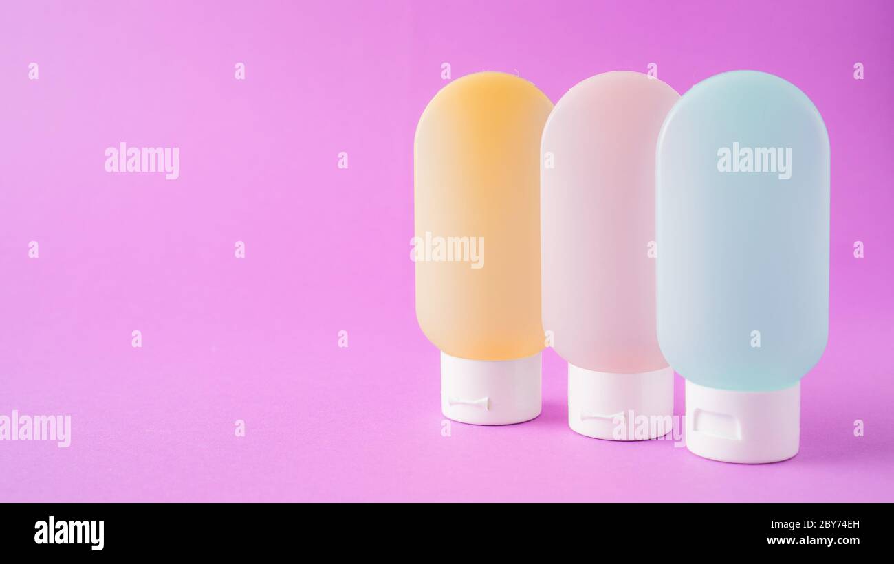 essential travel kit. toiletry kit. cosmetic bottles. small cosmetic