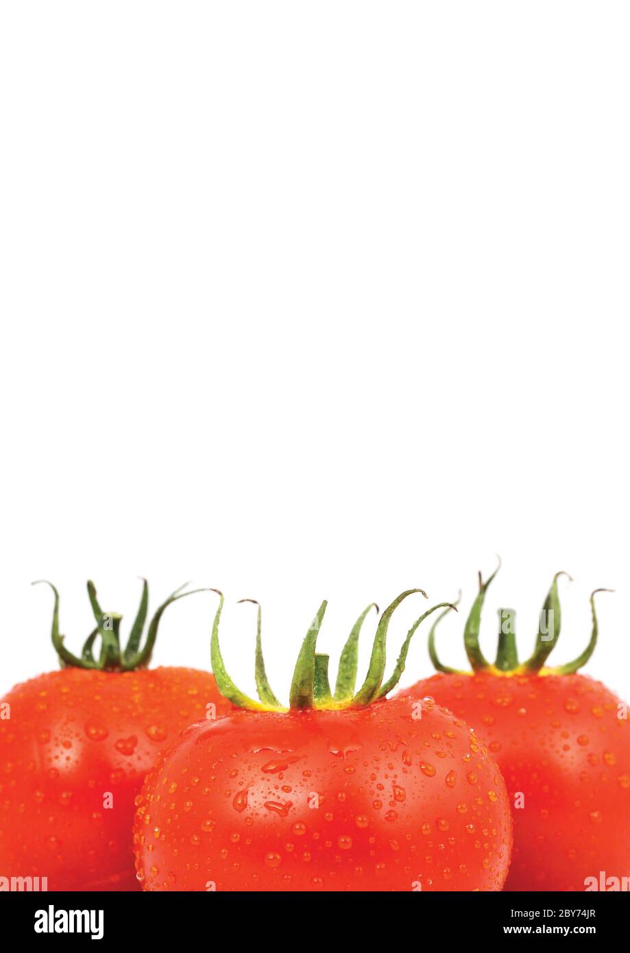Three red tomatos isolated on white background Stock Photo - Alamy