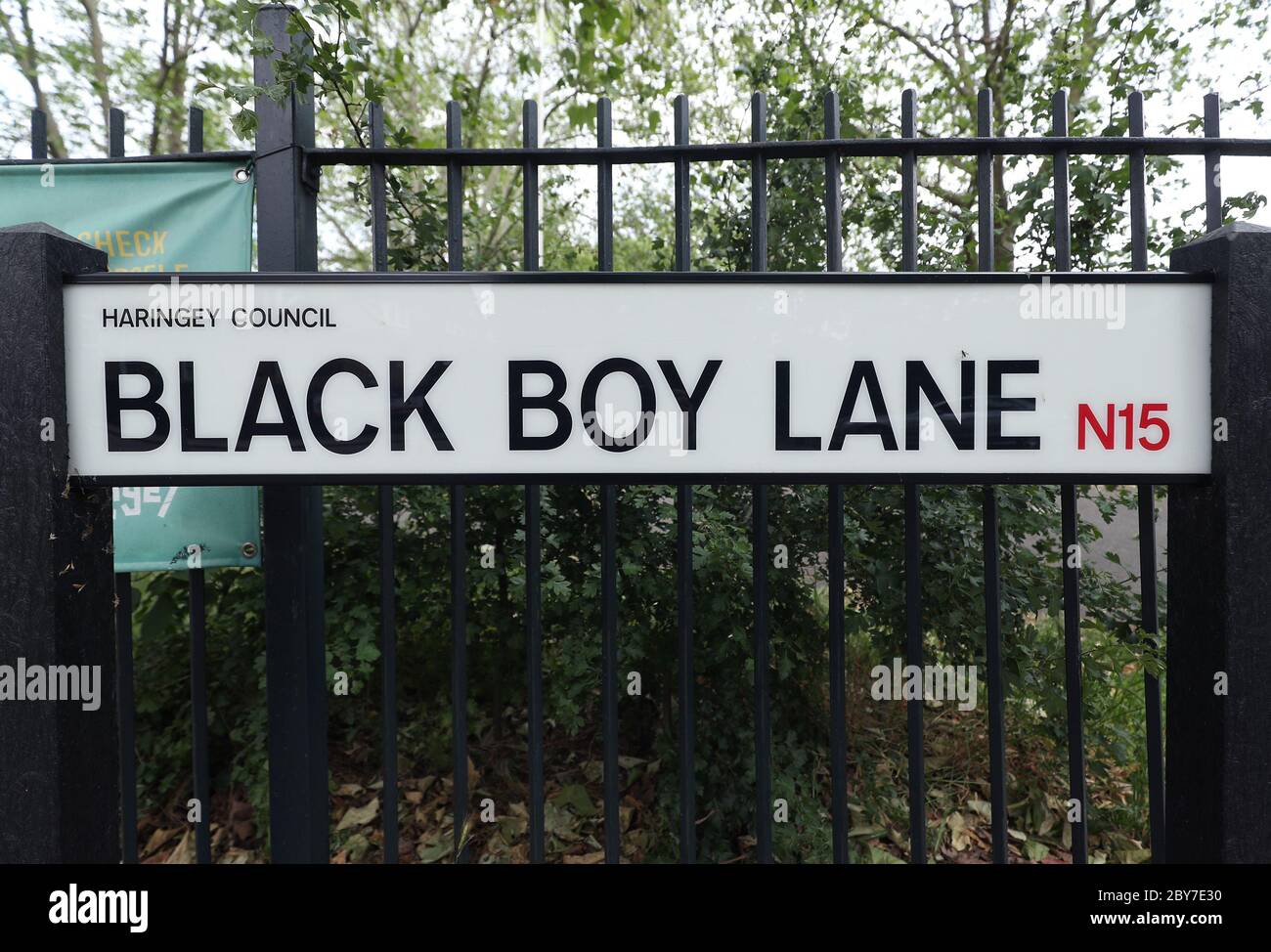 A street sign for Black Boy Lane in north London, as London mayor Sadiq Khan said that London's landmarks Ð including street names, the names of public buildings and plaques Ð will be reviewed to ensure they reflect the capital's diversity after protesters tore down a statue of slave trader Edward Colston in Bristol. Stock Photo
