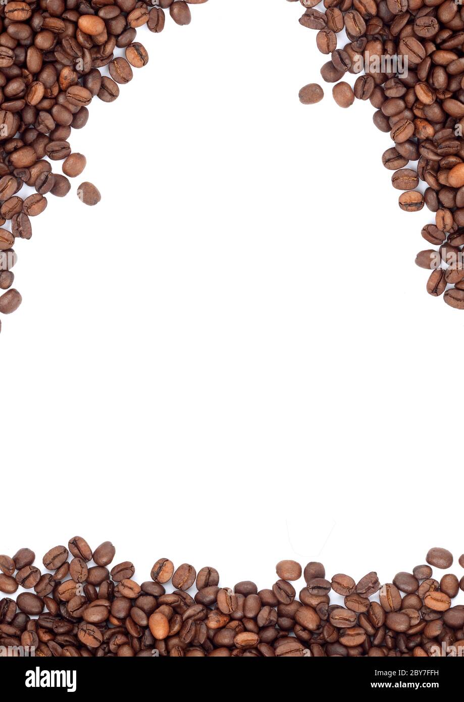 Brown roasted coffee beans isolated on white background Stock Photo - Alamy