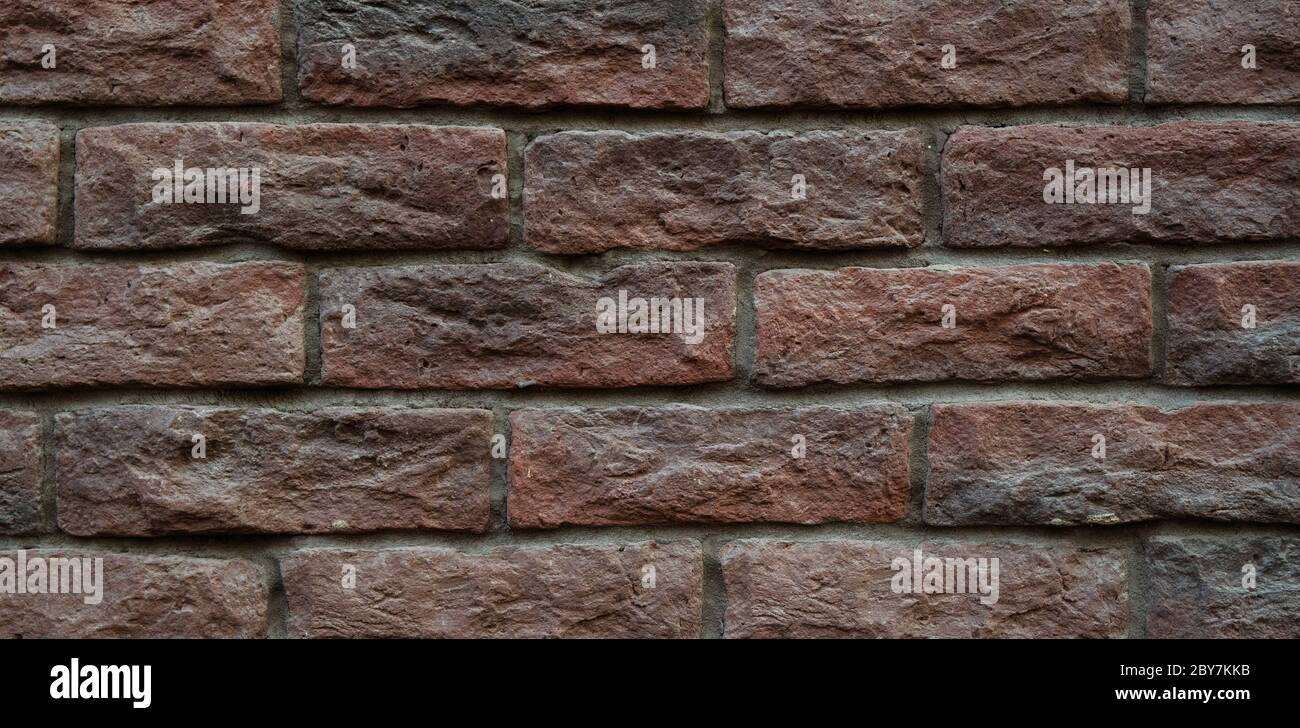 Brown hand made brick, loft. Qualitative background or texture for best projects. Stock Photo
