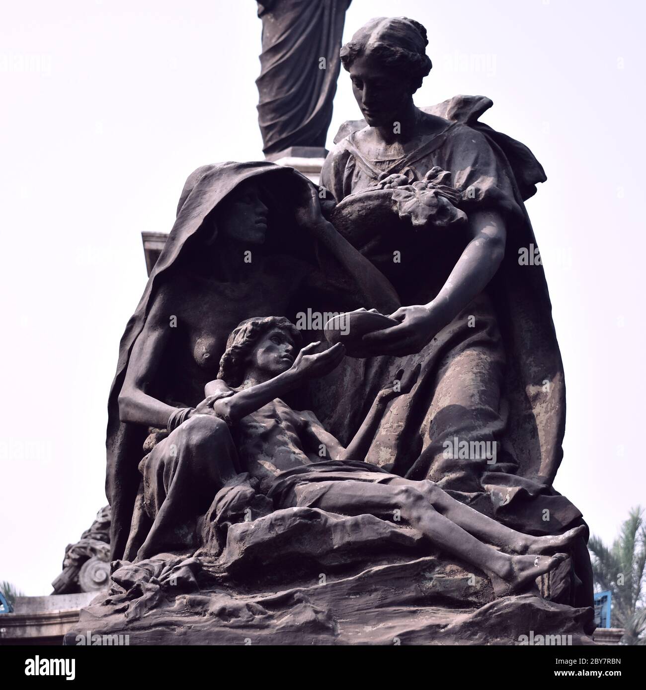 Famine Relief statue is located at Kolkata ,India . The statue was commissioned in 1913 on the memory of famine in India of 1899-1900. Stock Photo