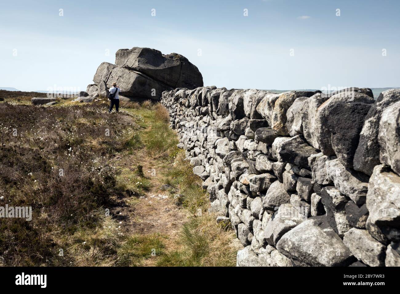 The Hitching Stone, a huge block of gritstone stands 6.5m high and has been estimated to weigh 1,000 tons. Stock Photo