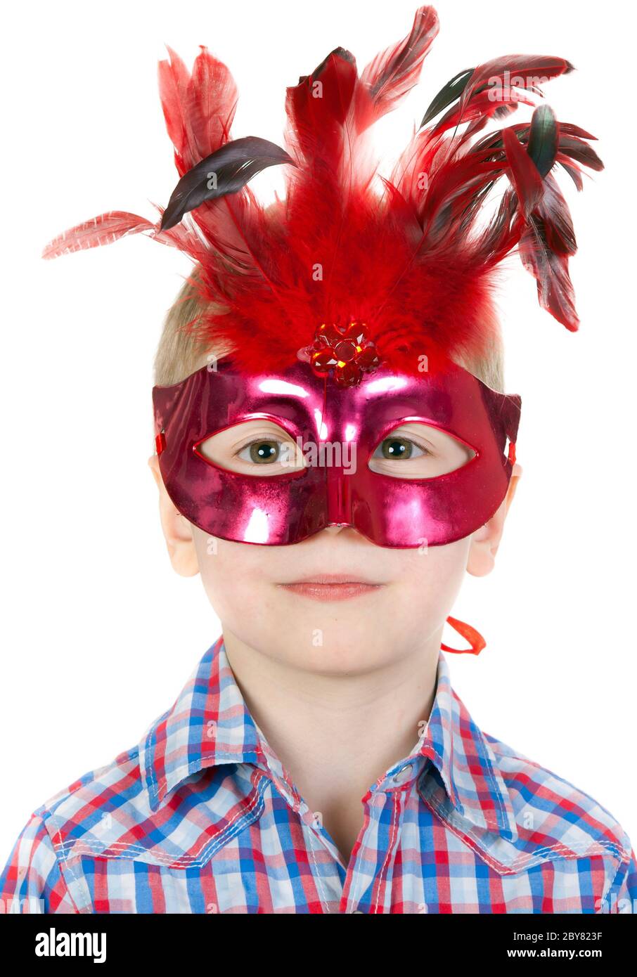 The Boy in the masquerade mask with feathers Stock Photo Alamy