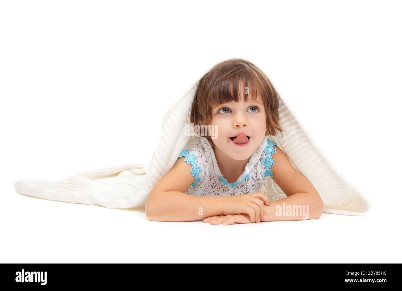 Portrait of young girl wrapped in blanket Cut Out Stock Images