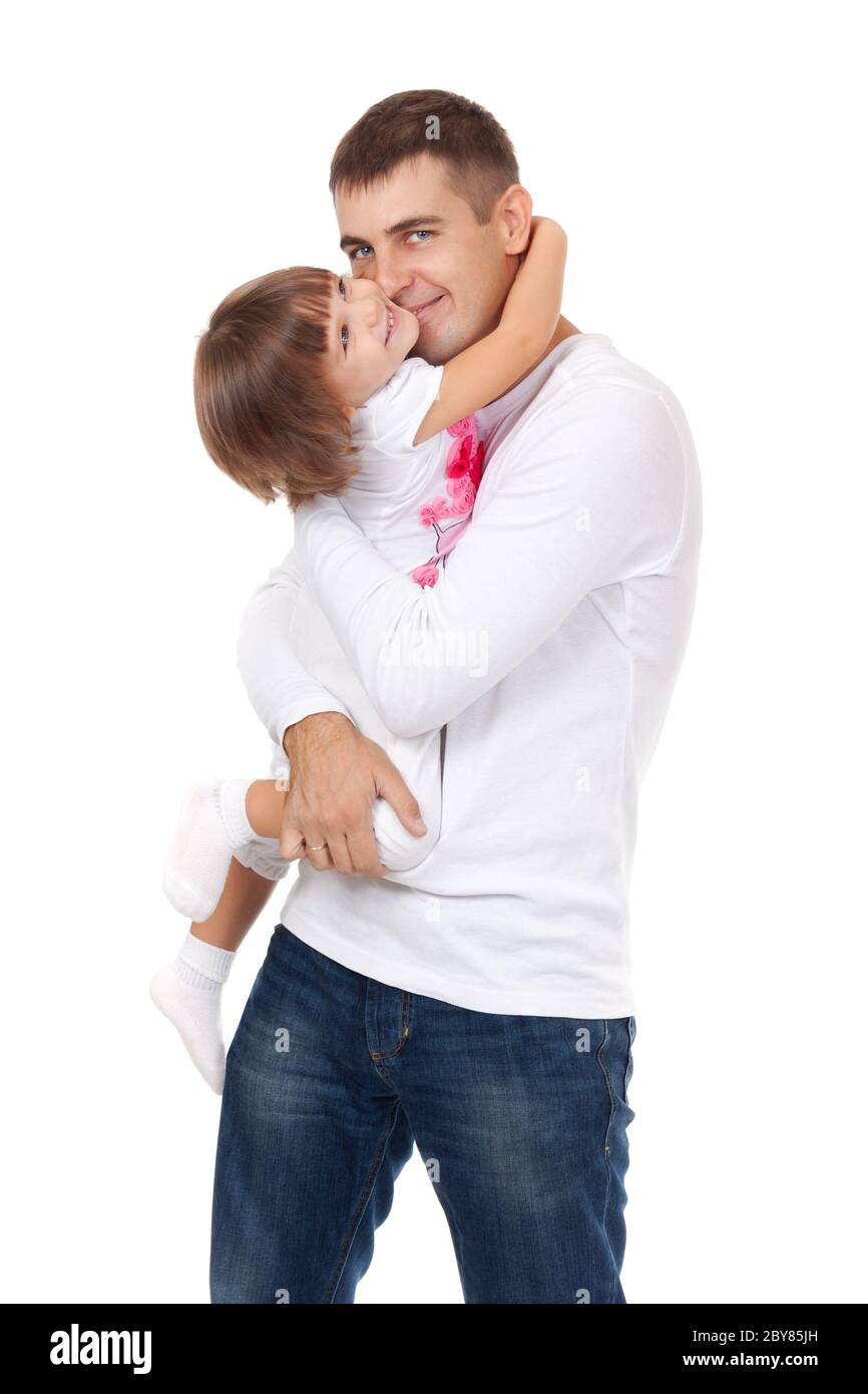 Studio portrait of loving young father hugging his child Stock Photo