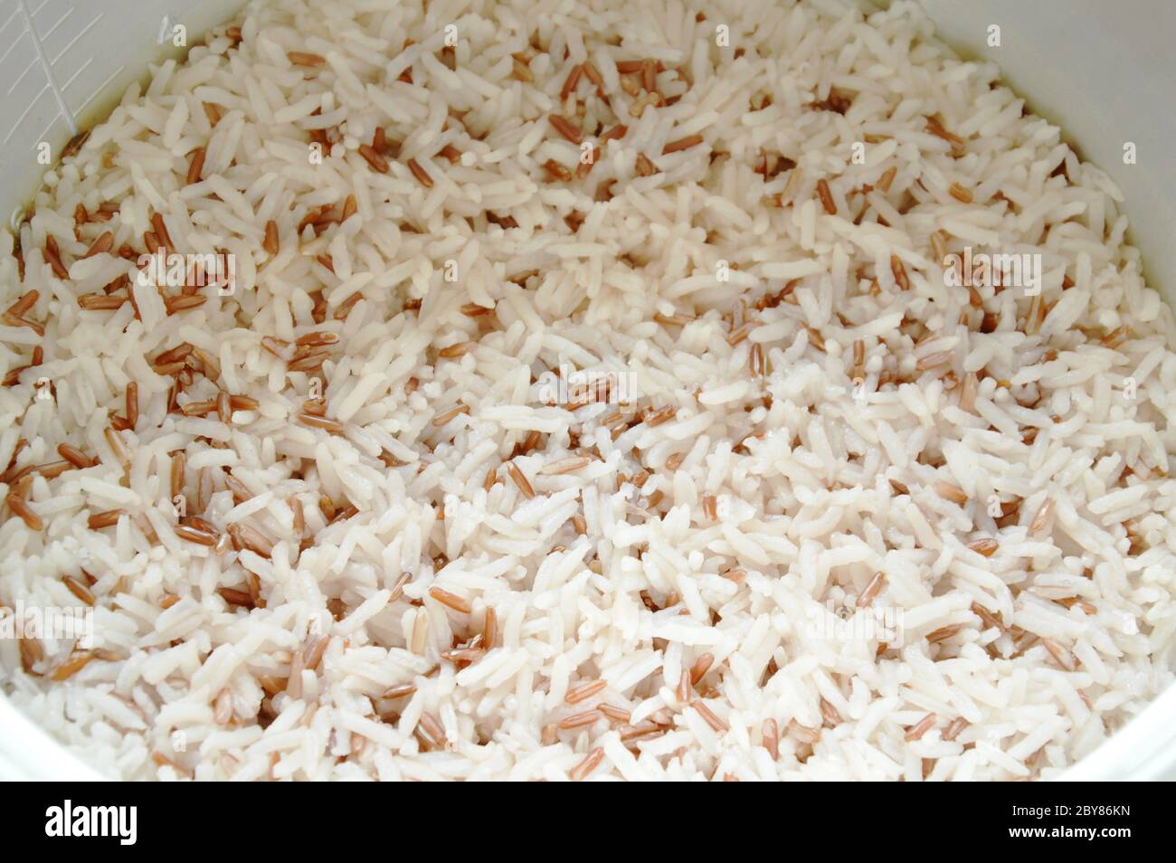 mixed red cargo rice steamed in cooking pot Stock Photo Alamy