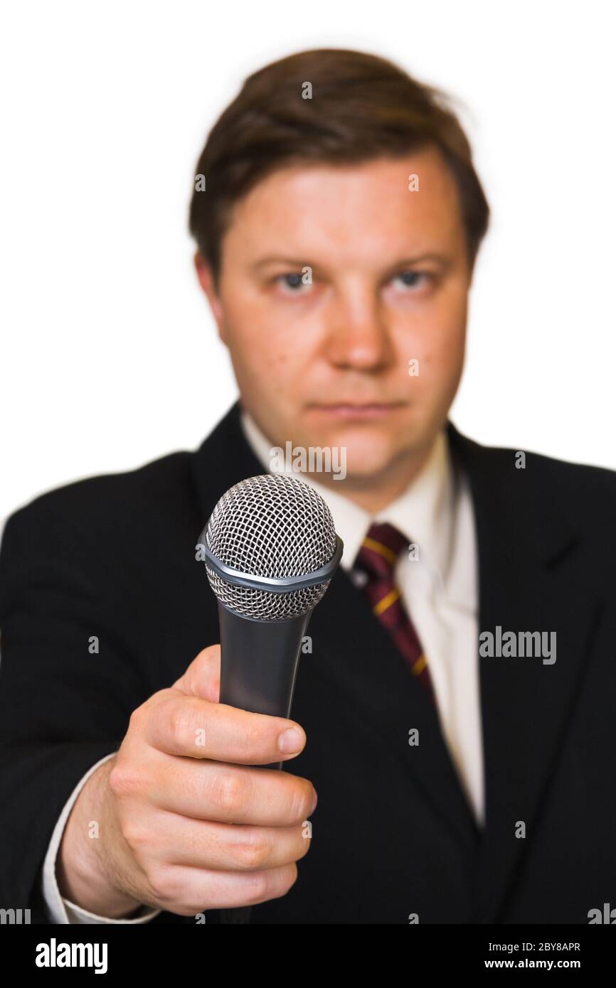 Journalist with microphone Stock Photo - Alamy