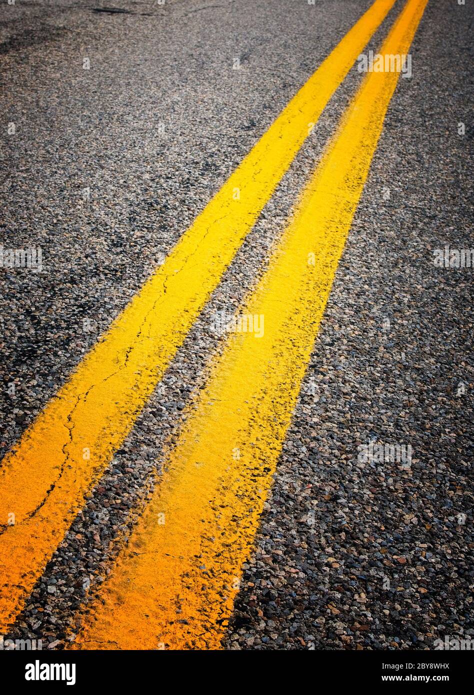 yellow dividing lines on the highway Stock Photo Alamy