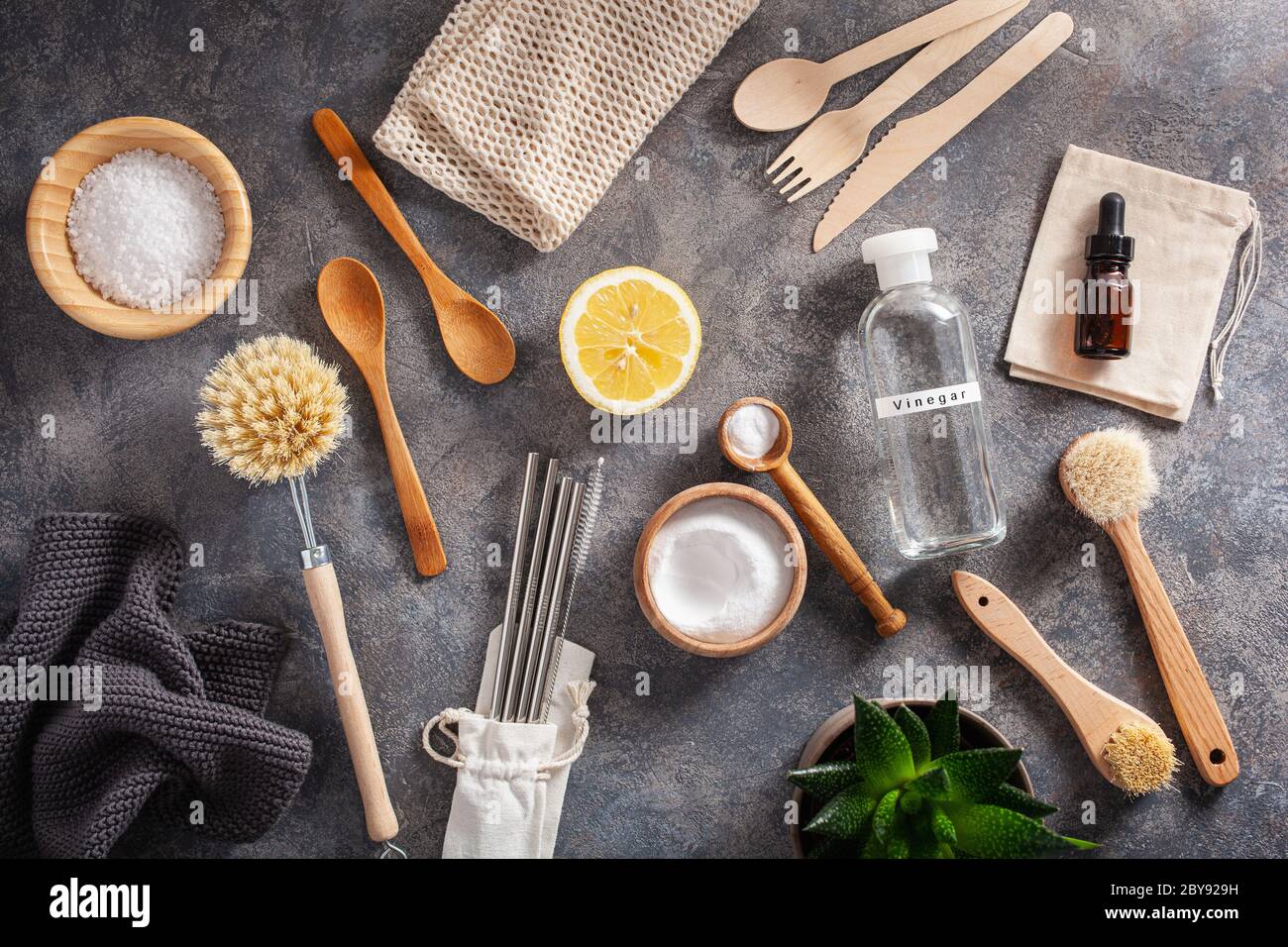 zero waste eco friendly cleaning kitchen concept. wooden brushes, lemon