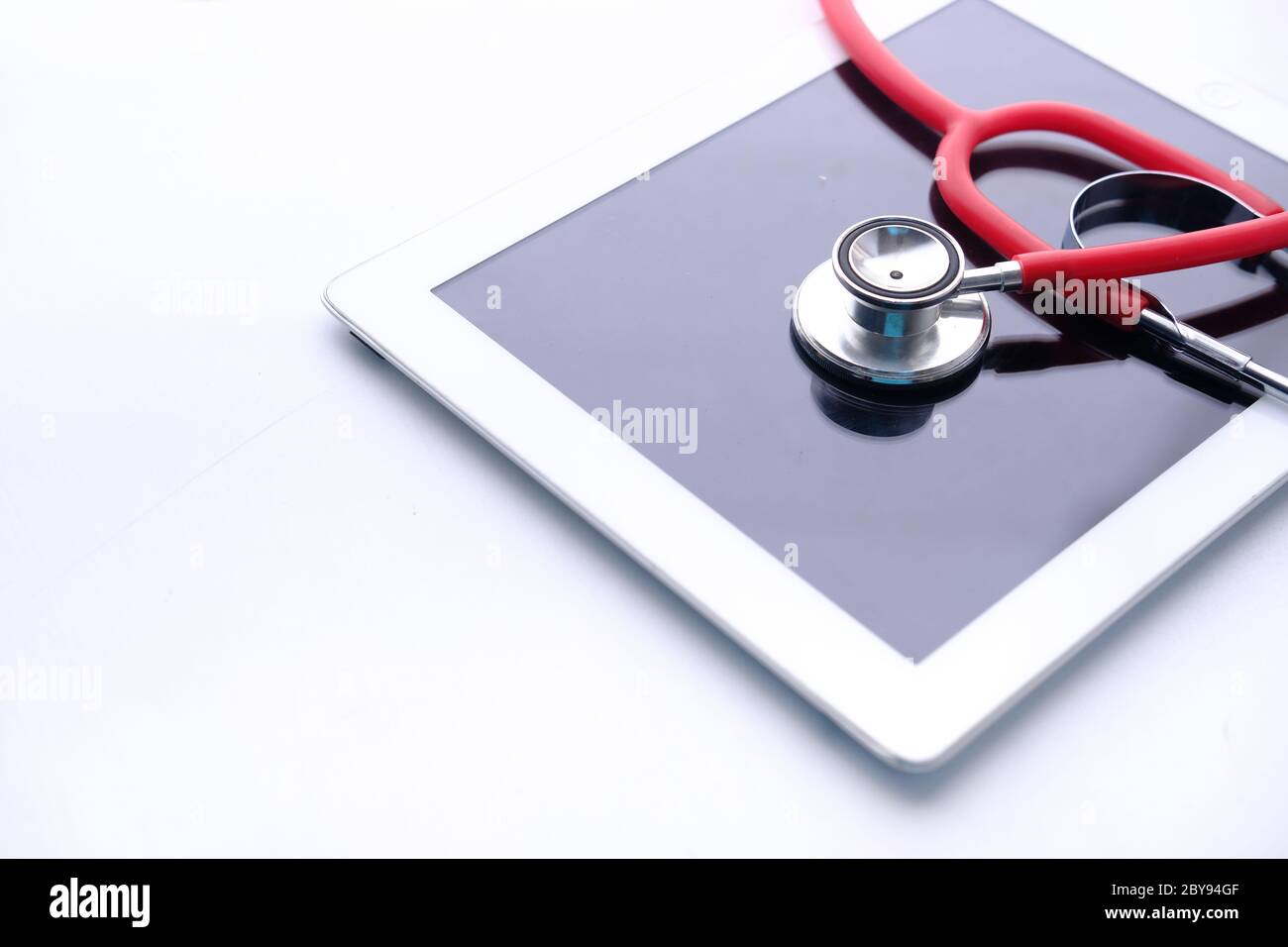 Medical Stethoscope On Modern Digital Tablet On White Background Stock ...