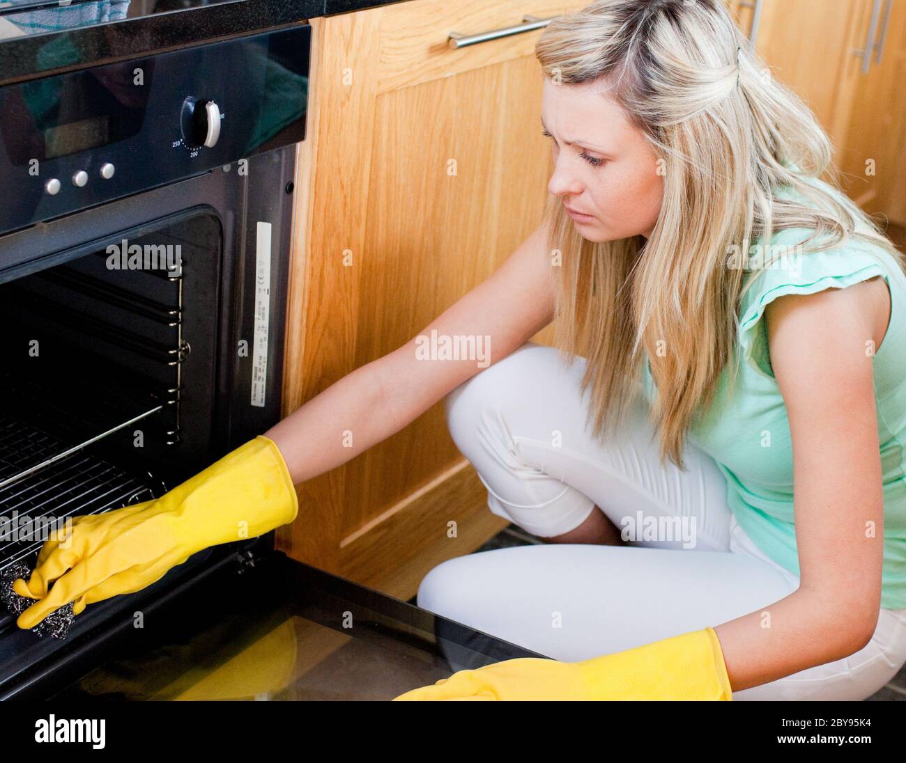 Elegant housewife in white hi-res stock photography and images - Alamy
