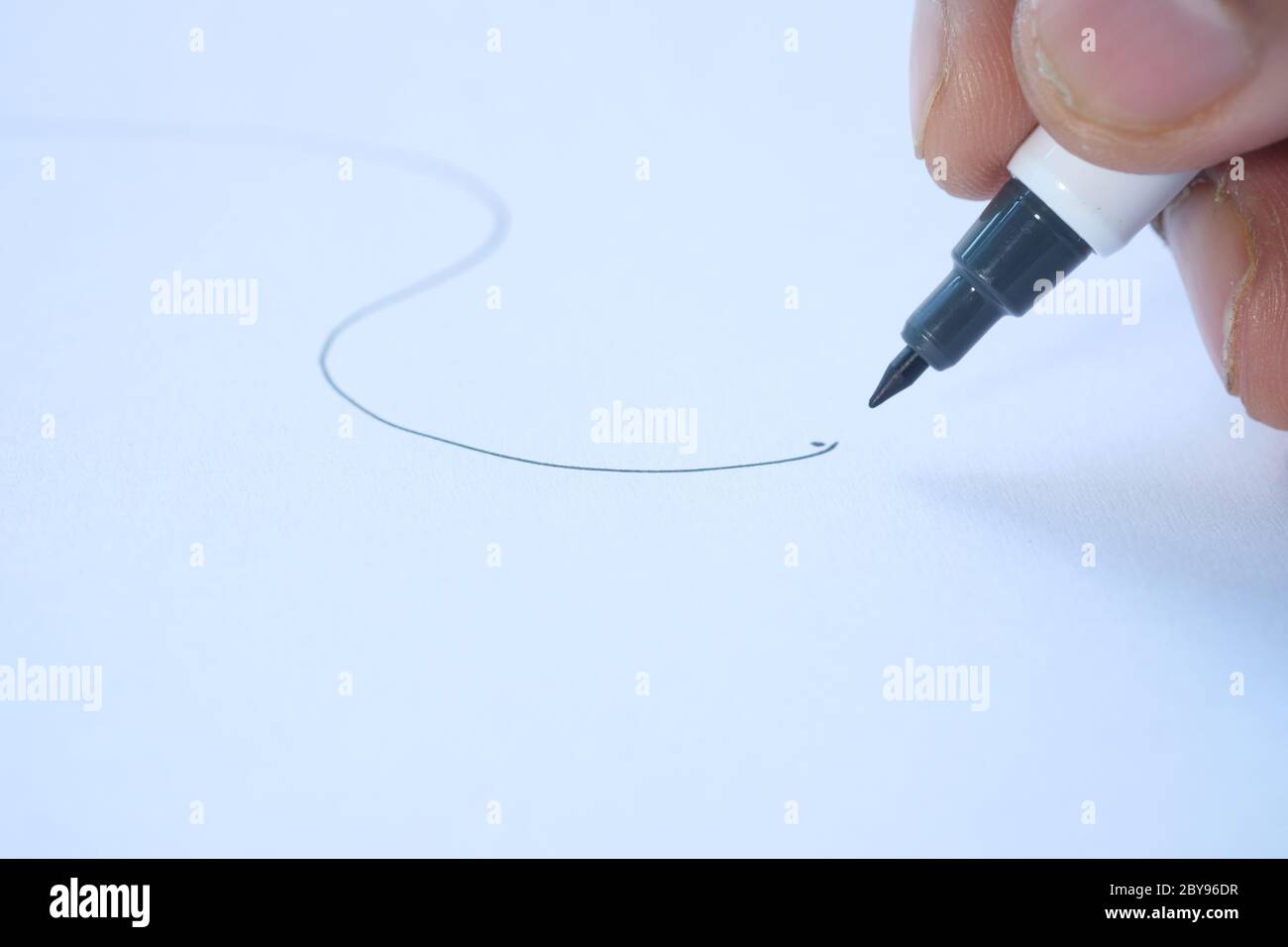 person hand writing on paper, close up  Stock Photo