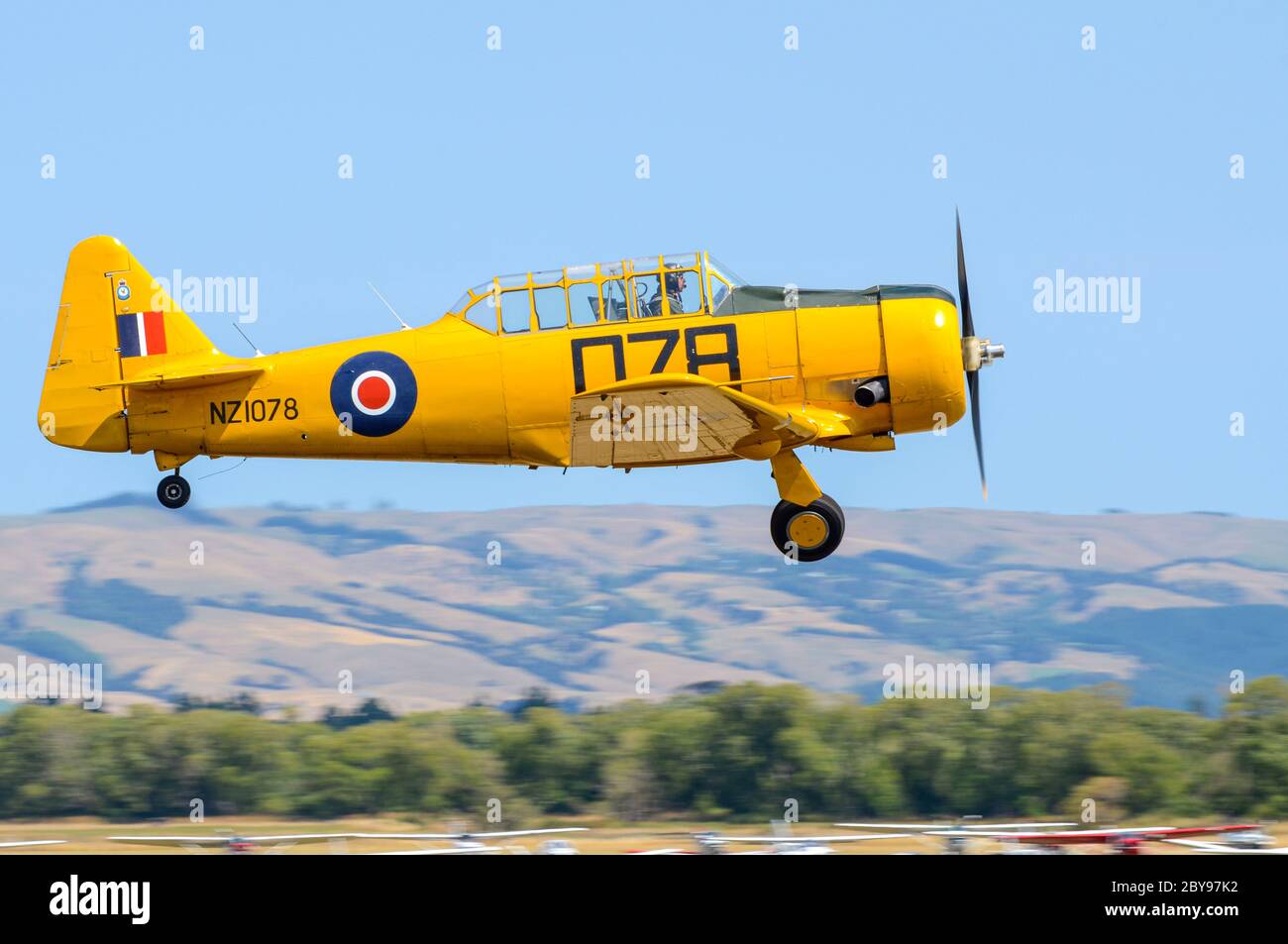 North American T-6 Harvard, Texan Second World War training plane at Wings over Wairarapa airshow, Hood Aerodrome, Masterton, New Zealand. RAF yellow Stock Photo