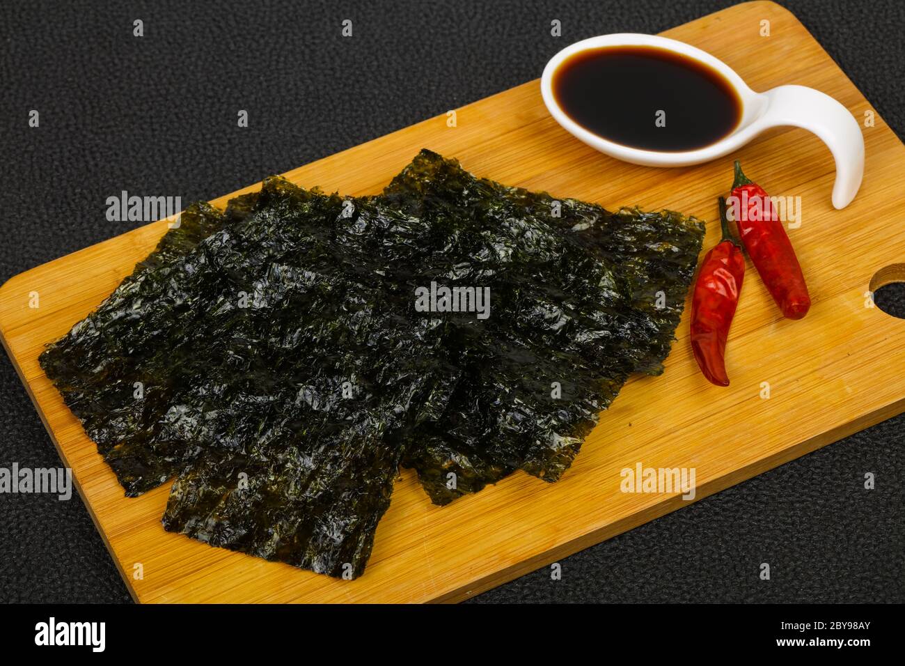 Tasty Nori chips with soya sauce Stock Photo Alamy