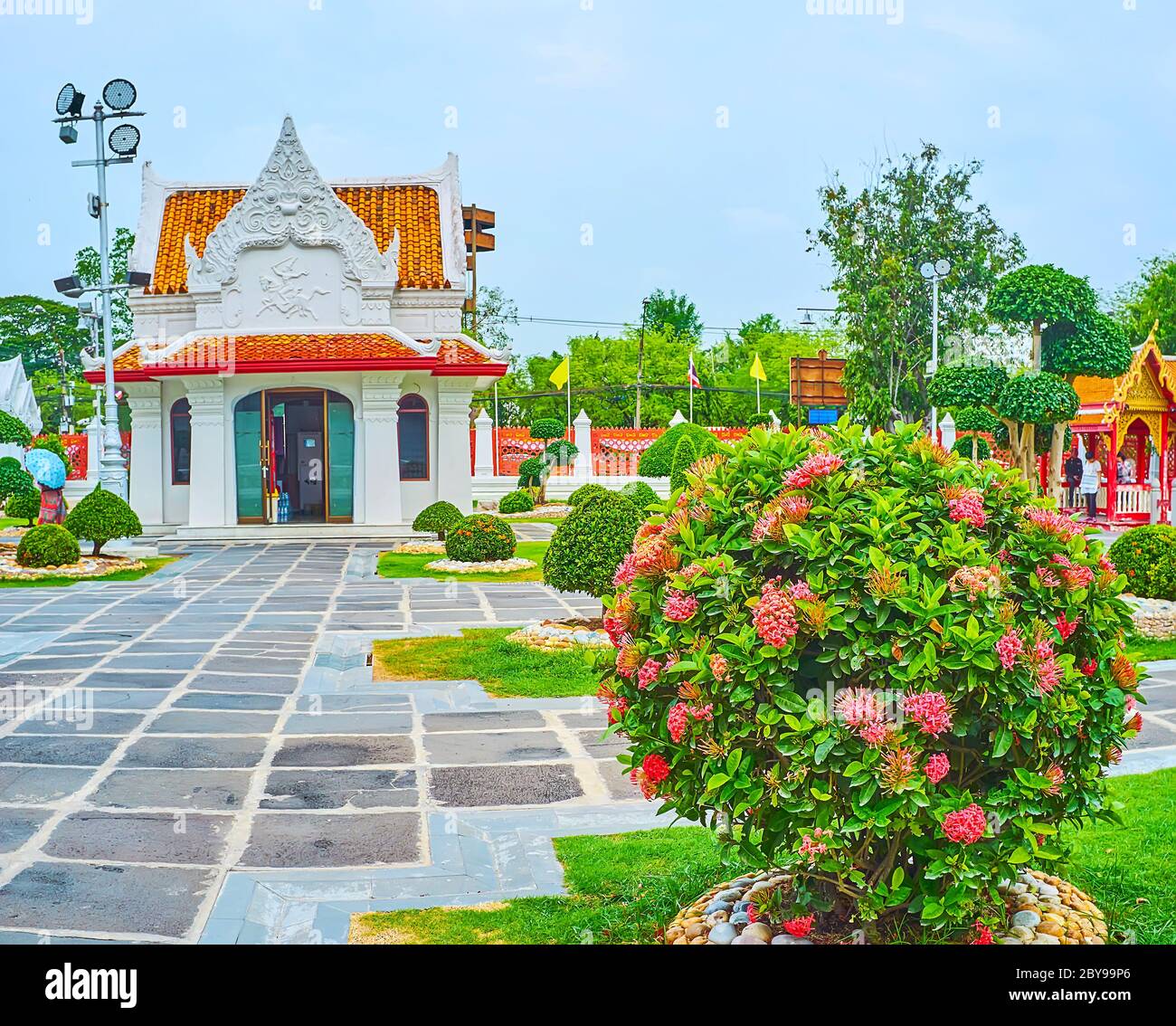 The scenic white pavilion in topiary garden of Wat Benchamabophit Dusitvanaram Marble Temple, Bangkok, Thailand Stock Photo