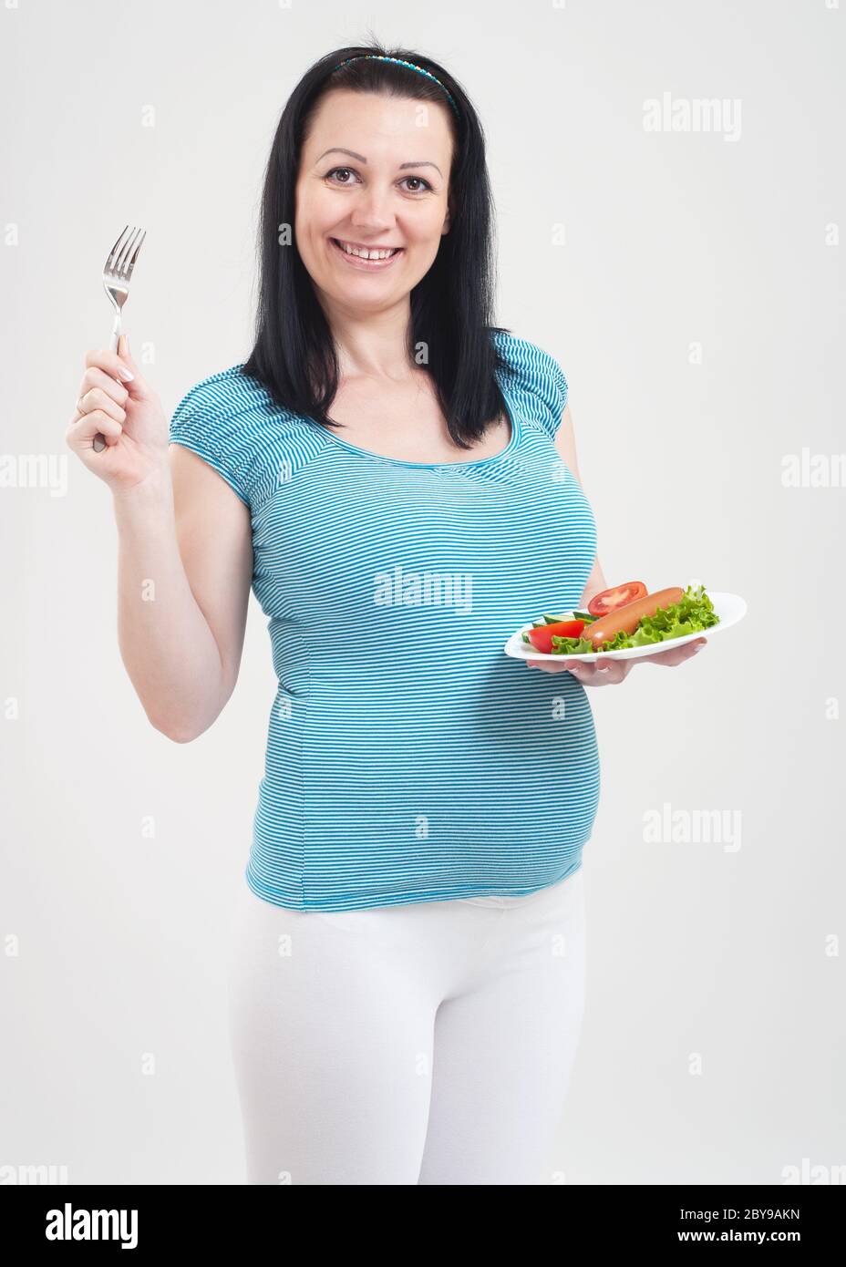 Pregnant belly plate of food hi-res stock photography and images - Alamy