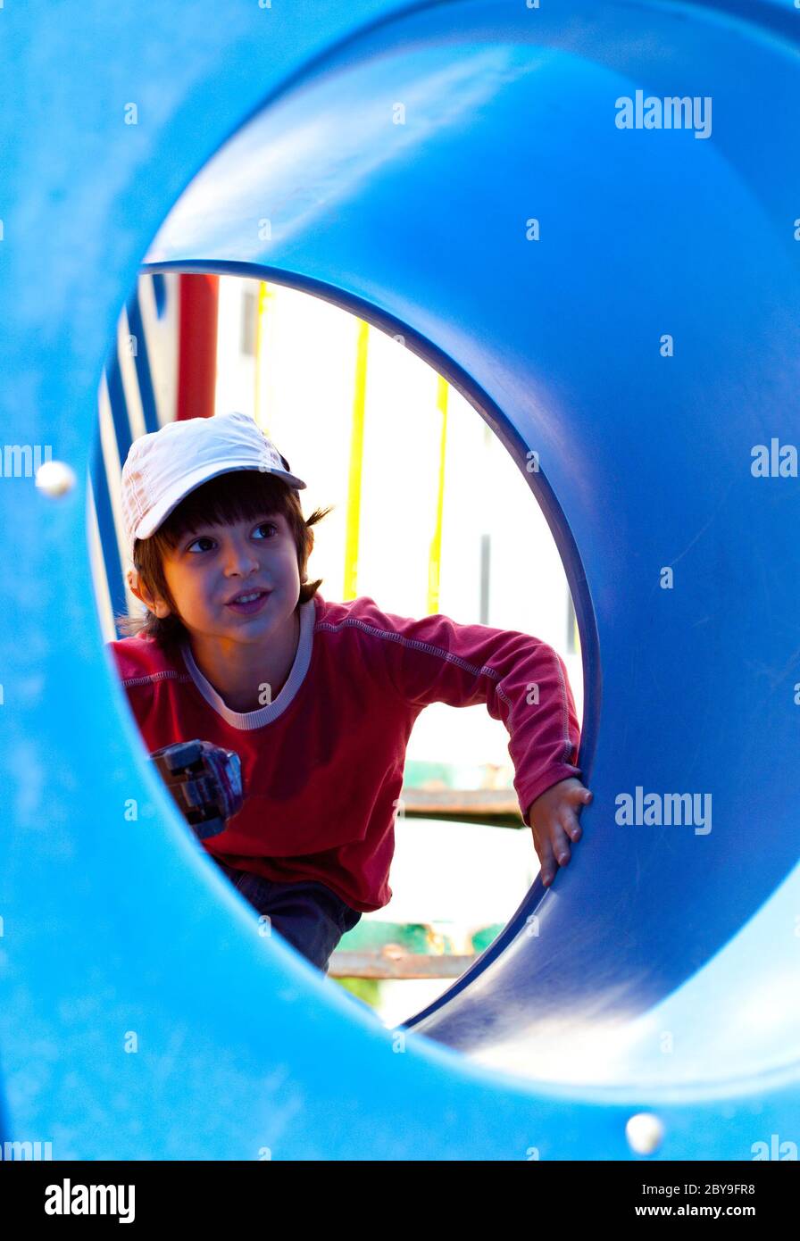 smiling little boy in a baseball cap Stock Photo
