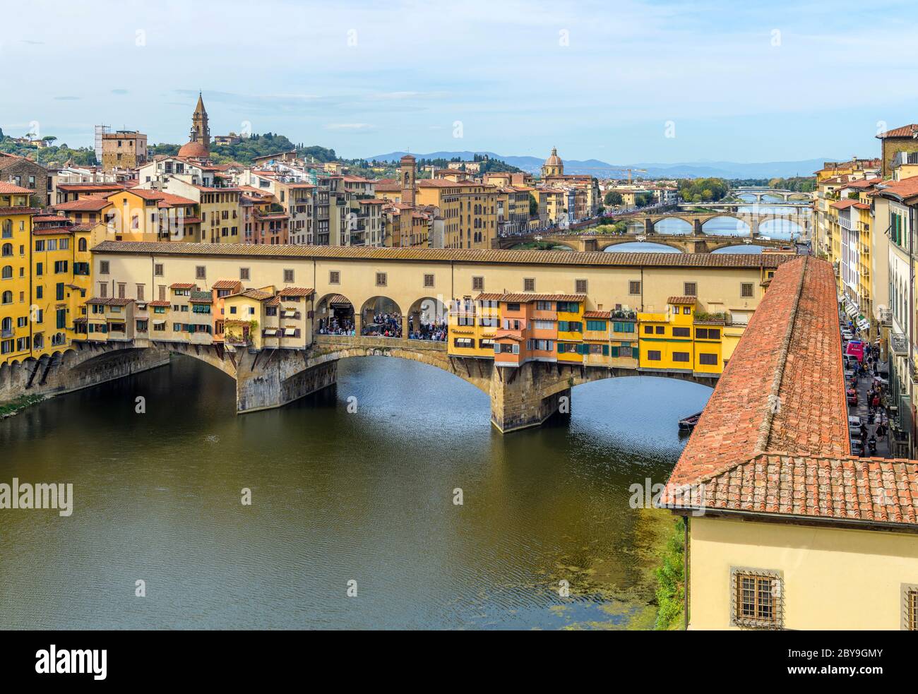 Arno River in Florence - A panoramic overview of Arno River at the Ponte Vecchio 'Old Bridge' in the heart of Florence, Tuscany, Italy. Stock Photo