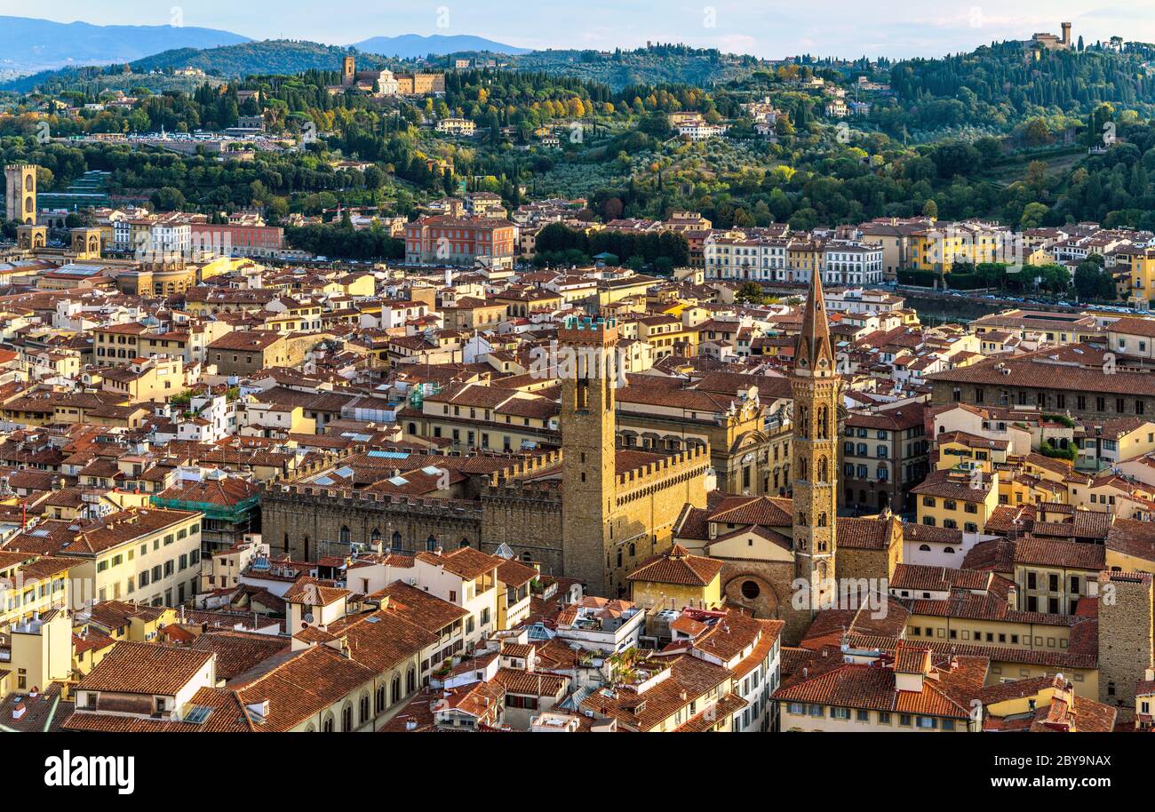 Sunset Florence - Panoramic sunset overview of Bell towers in south side of Old Town of Florence, as seen from Brunelleschi's Dome. Tuscany, Italy. Stock Photo