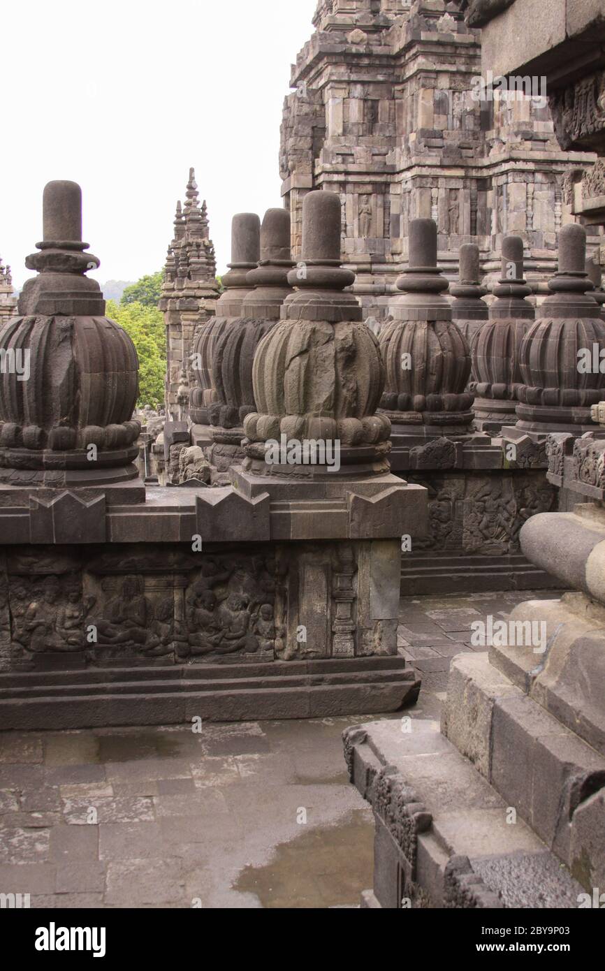 Stone carved detail at famous Prambanan hindu temple, Yogyakarta, Java, Indonesia. Candi Prambanan - Stone structures and rubble at iconic travel dest Stock Photo