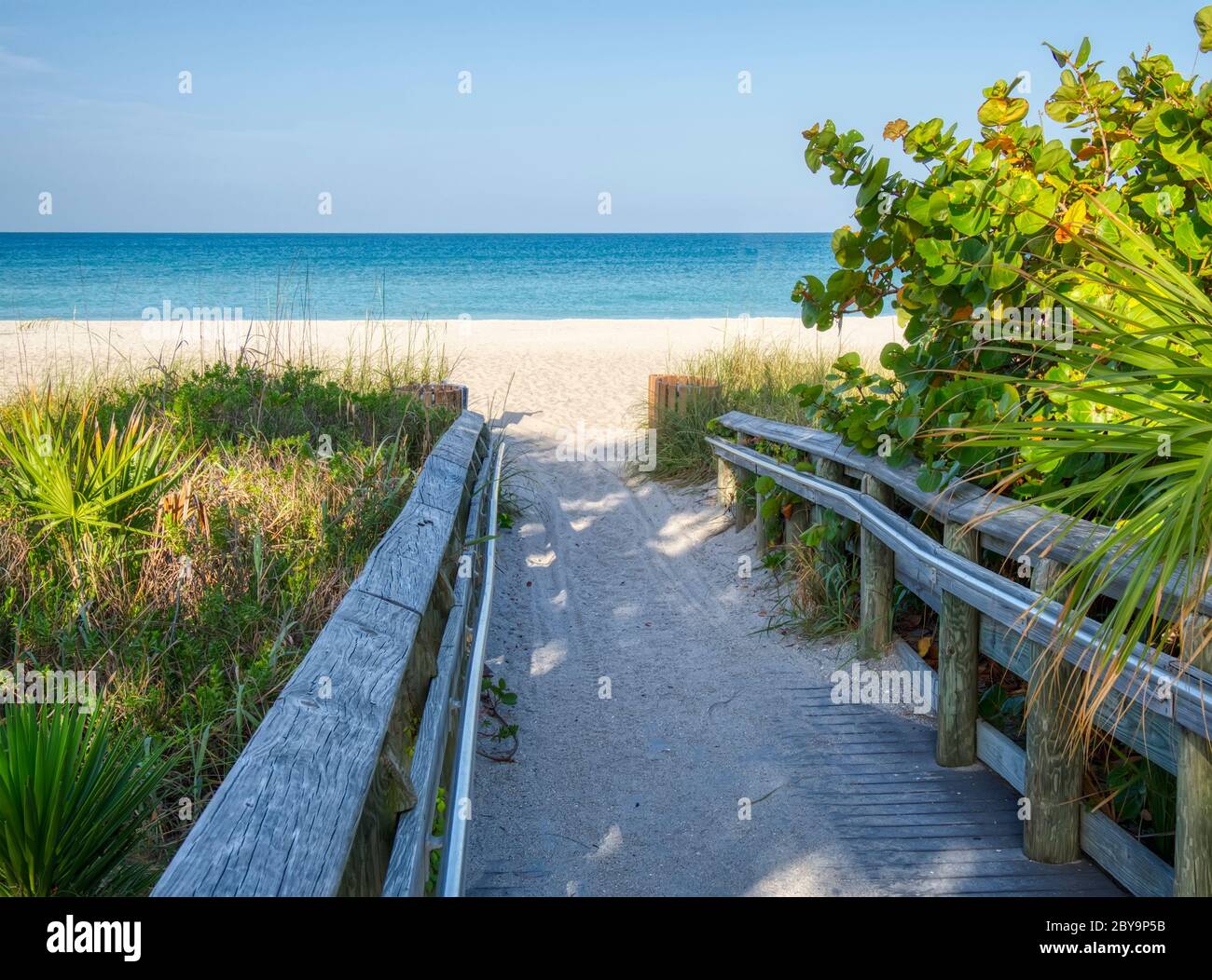 Walkway to empty beach on the Guilf of Mexico in Florida in the United States Stock Photo