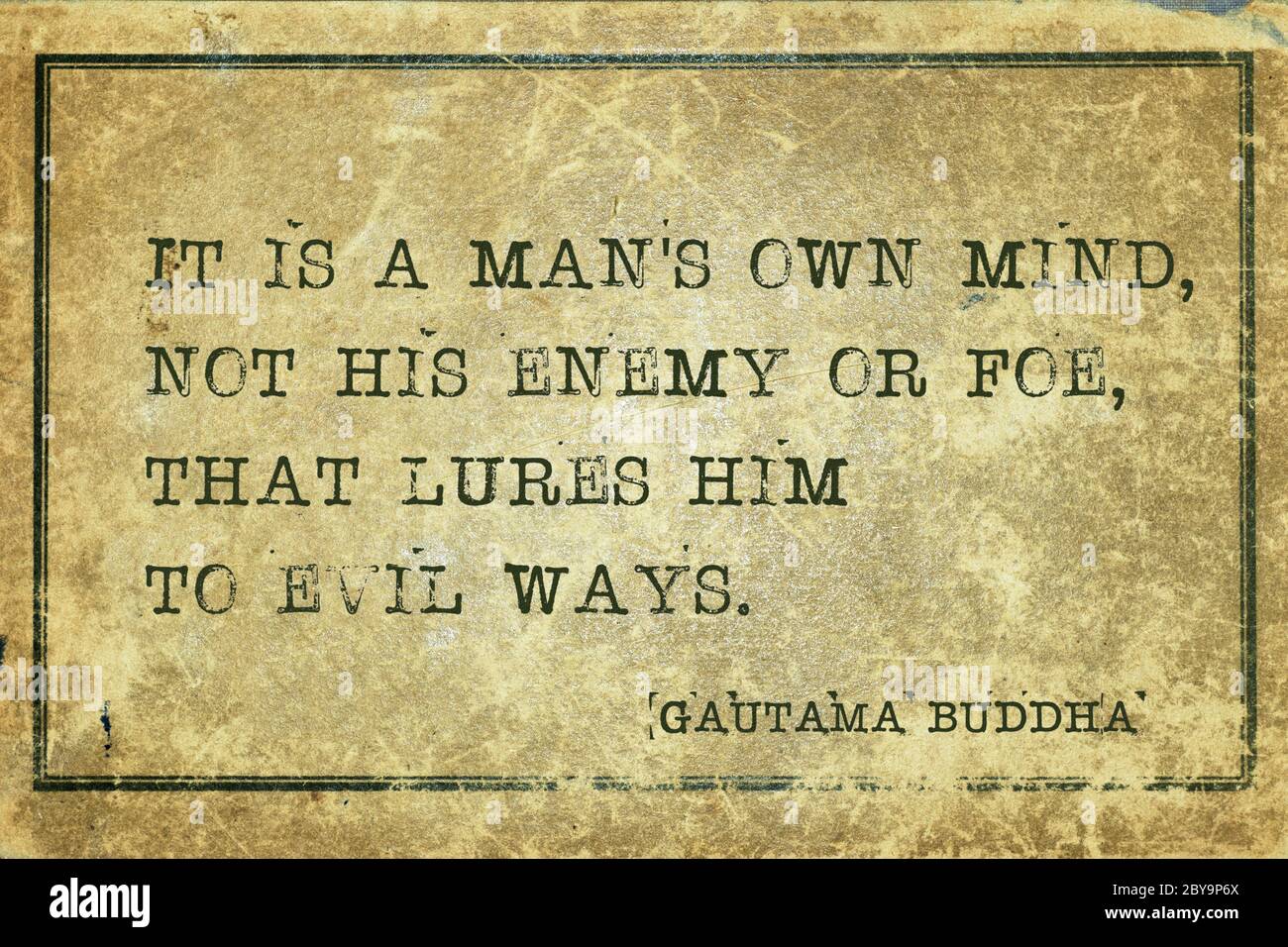 It is a man's own mind, not his enemy or foe, that lures him to evil ways - famous quote of Gautama Buddha printed on grunge vintage cardboard Stock Photo