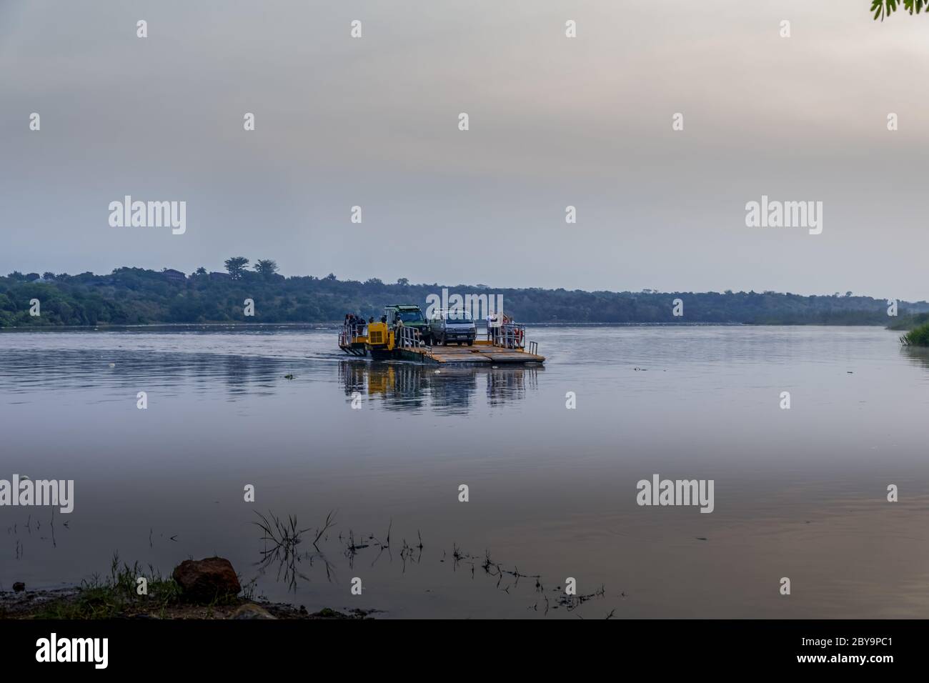 Murchison Falls national park / Uganda - Februari 20 2020: Ferry crossing the Nile river to bring the safari tourists to the other side. Stock Photo