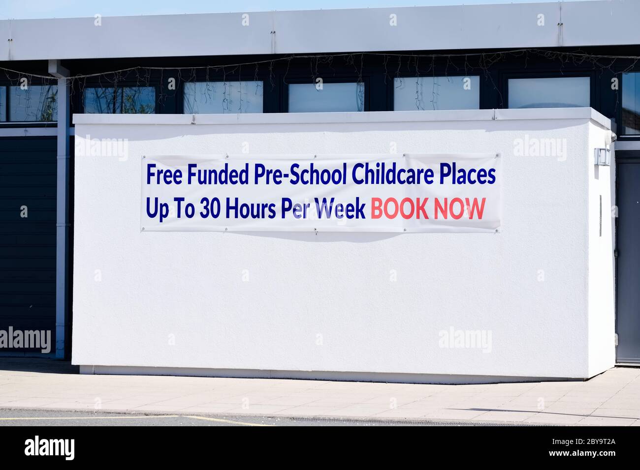 Pre school childcare nursery places available sign Stock Photo