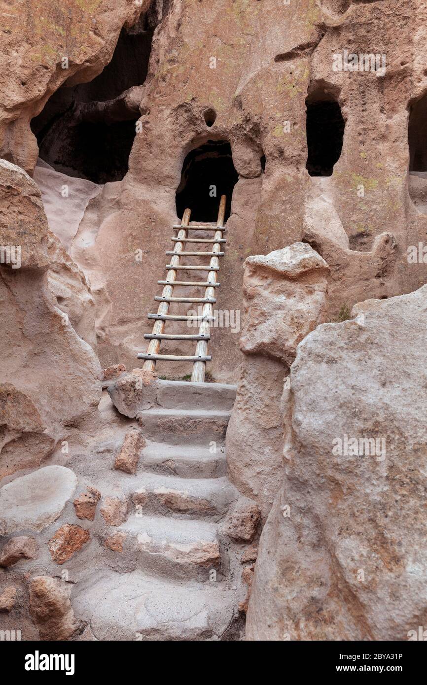 NM00617-00...NEW MEXICO - Cliff dwellings, talus houses, along the Main Loop Trail in Bandelier National Monument. Stock Photo
