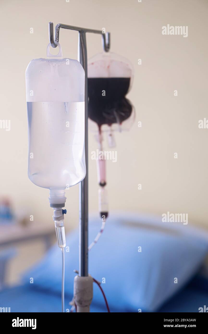 Spare blood bags from laboratory medical hanging on a steel pole at the