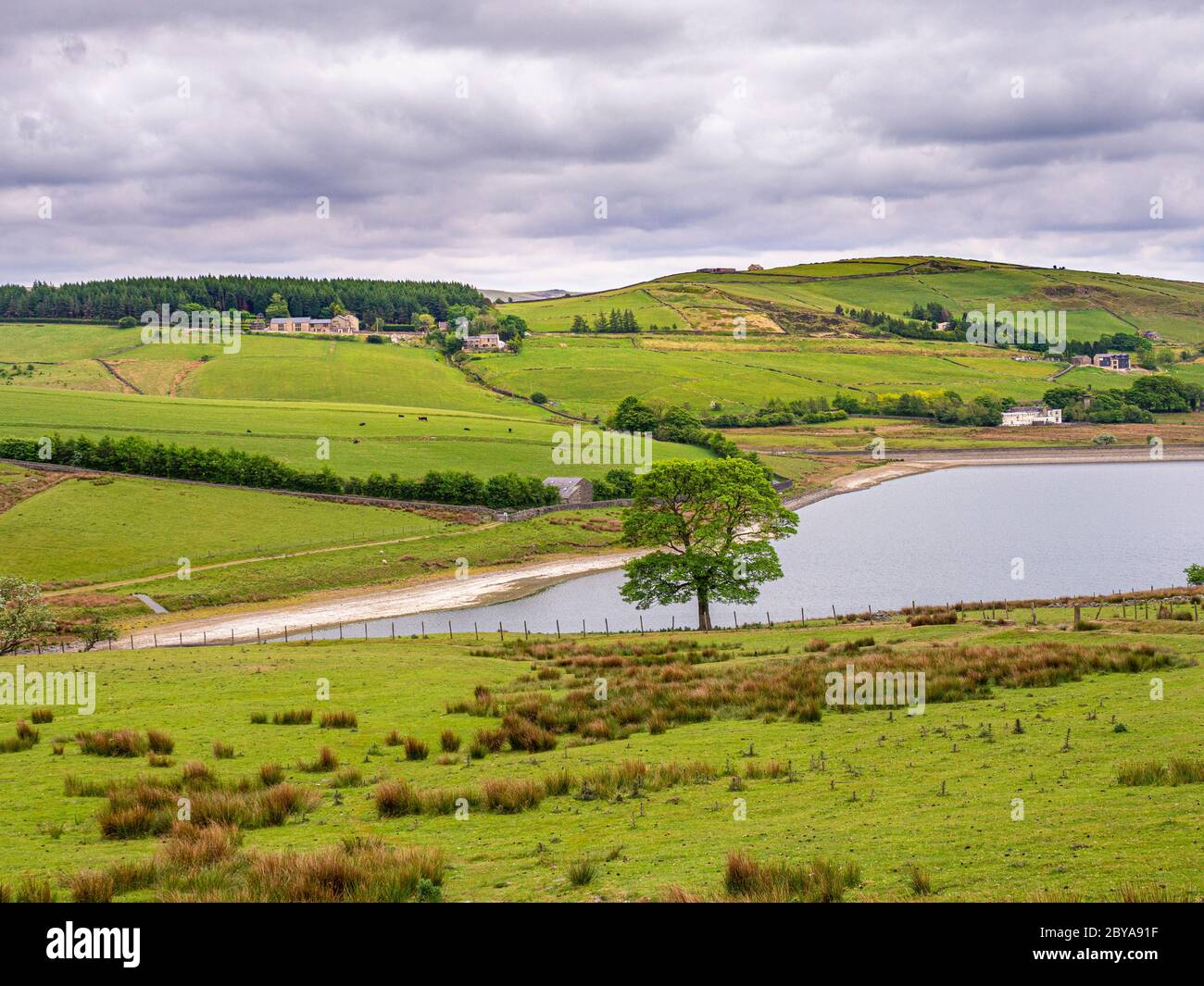 Castleshaw Lower Reservoir with Castleshaw Centre in the distance. Oldham, Lancashire. UK Stock Photo