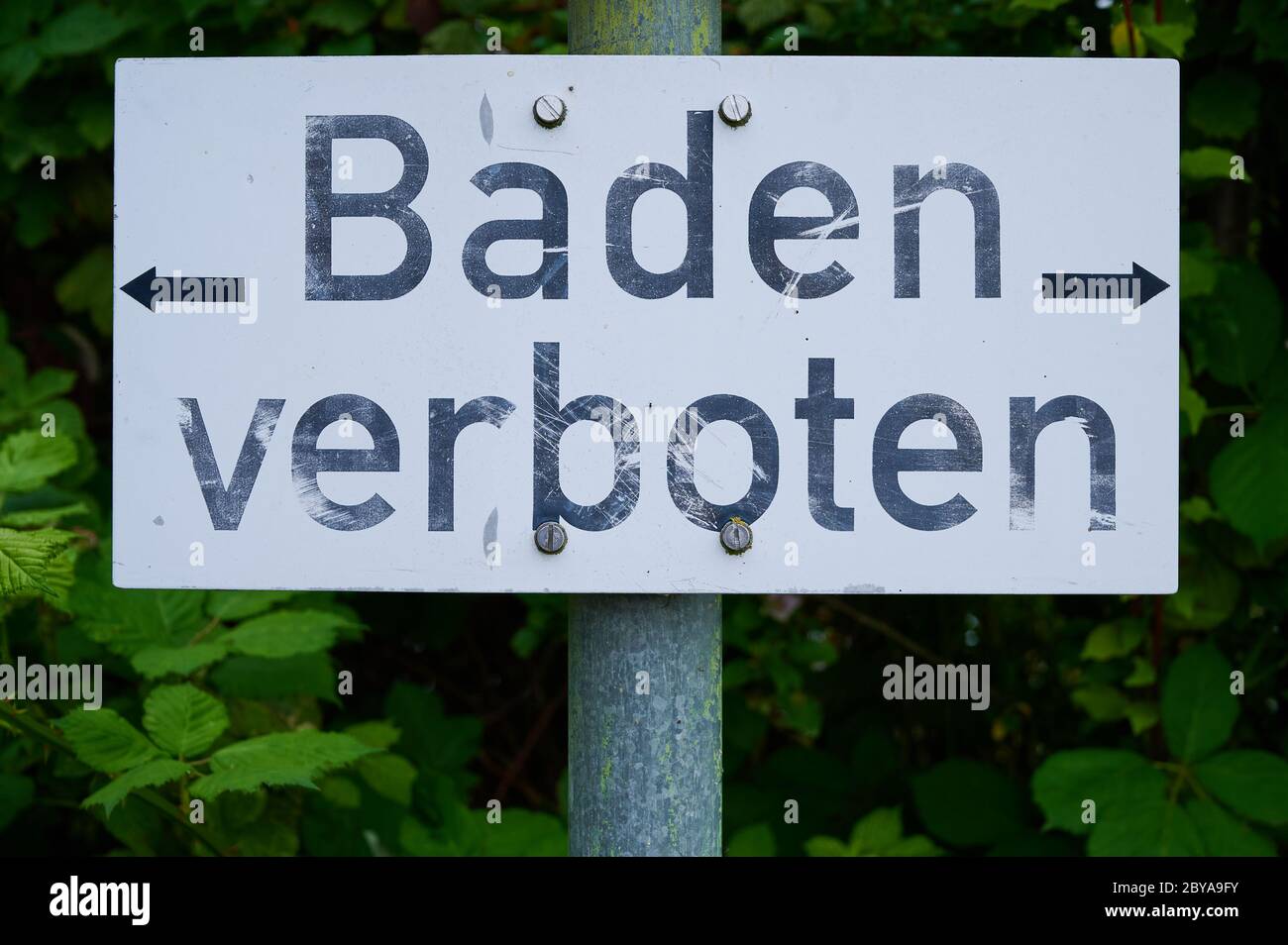 German sign with the words -bathing forbidden- Stock Photo