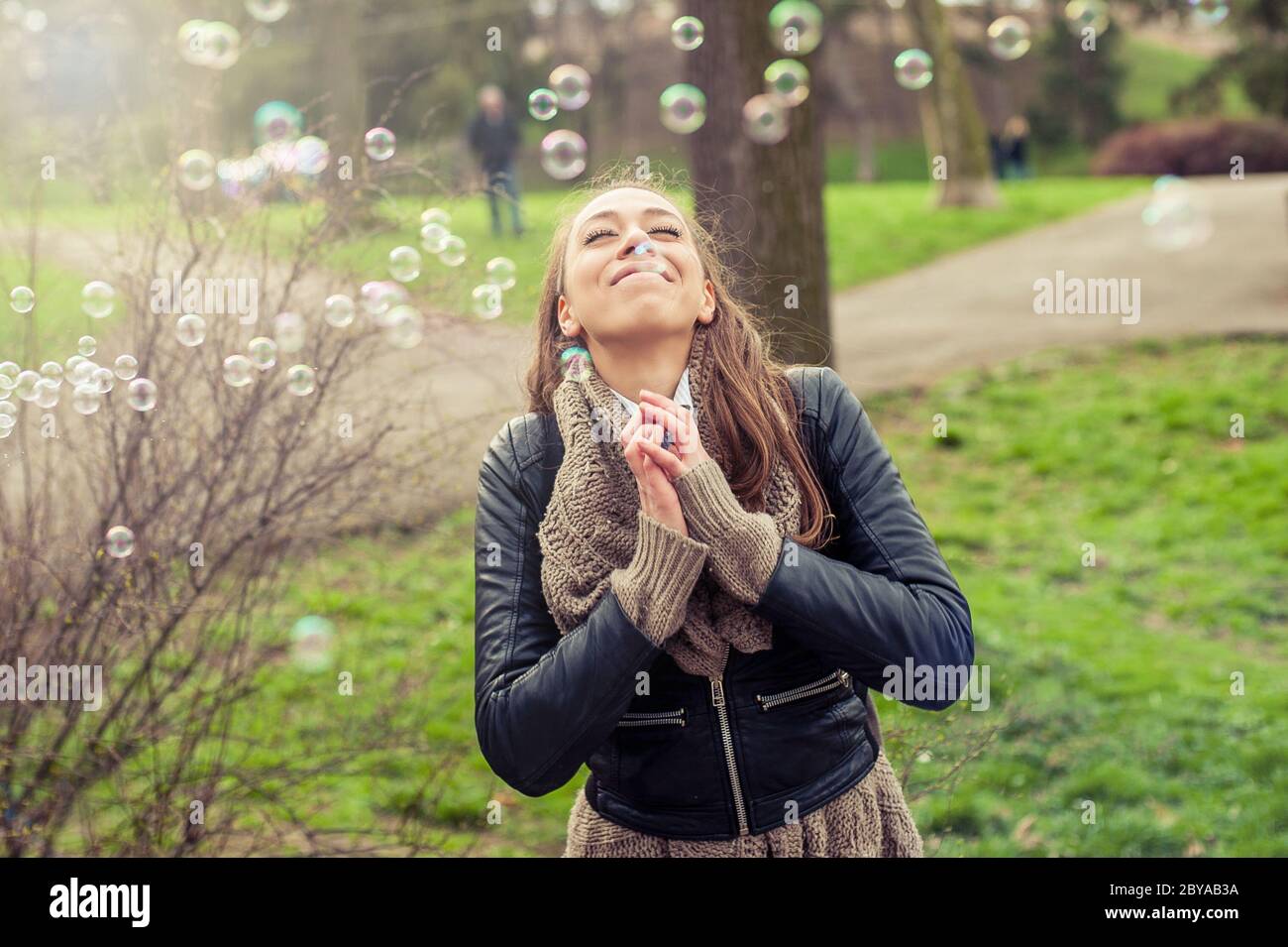 Happy and satisfied young woman enjoying life Stock Photo