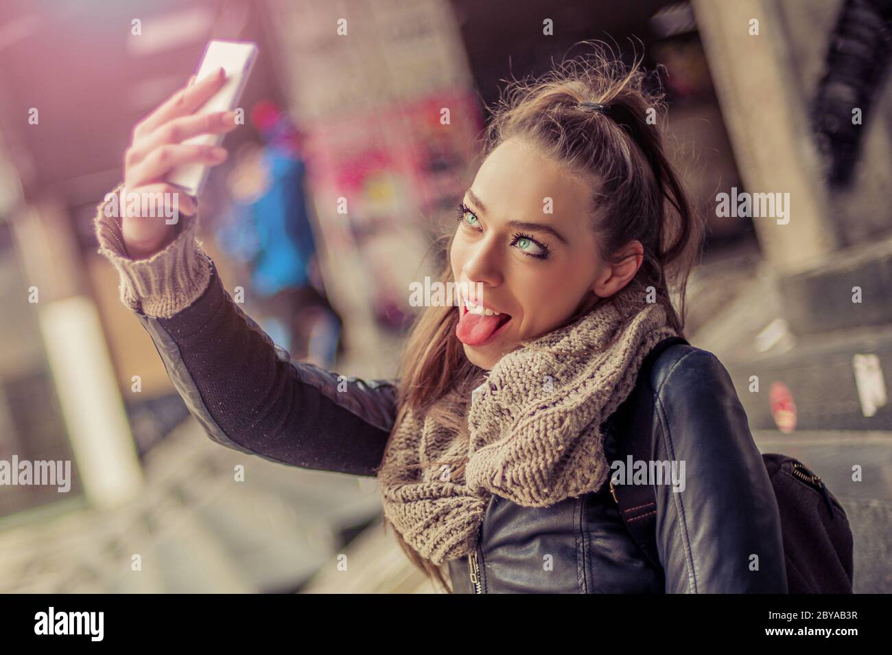 Pretty student girl taking a selfie with her cell phone Stock Photo - Alamy