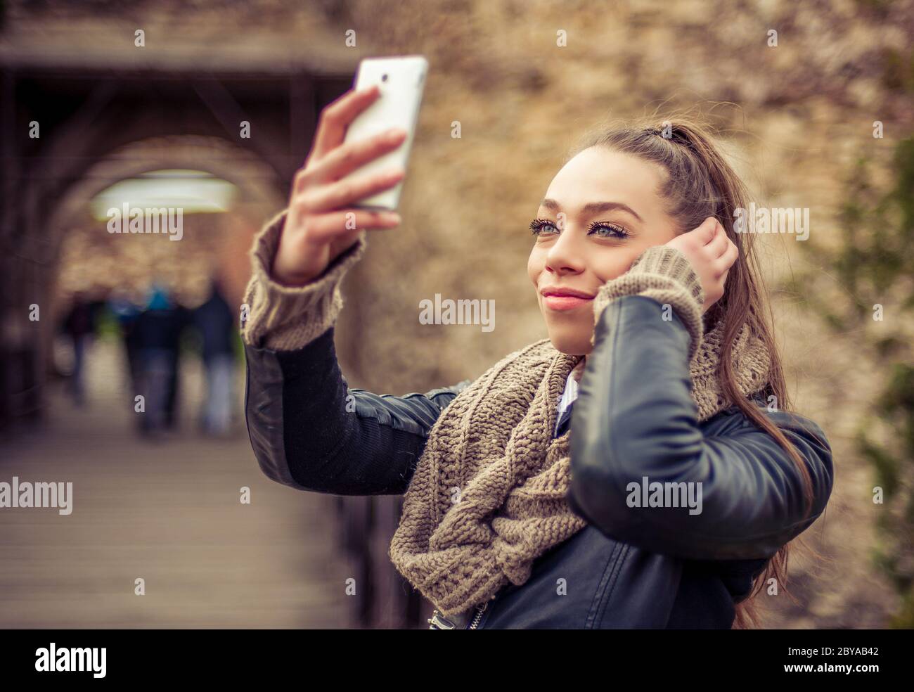 Pretty student girl taking a selfie with her cell phone Stock Photo - Alamy