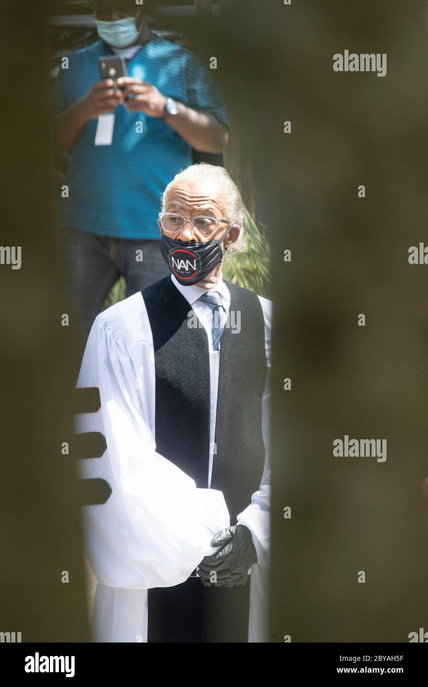 Family members along with Reverend AL Sharpton prepare to enter the sanctuary of Fountain of Praise Church in Houston on June 9, 2020 for the funeral service honoring the life of GEORGE FLOYD. Floyd 's death in late May by a white policeman set off hundreds of protests worldwide against police brutality and racism. Stock Photo