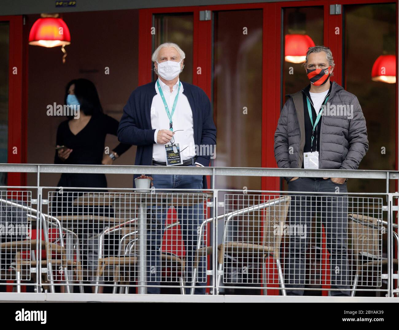 09 June 2020, Saarland, Völklingen: Football: DFB Cup, 1st FC Saarbrücken - Bayer Leverkusen, semi-finals: Rudi Völler (l), Managing Director Sports of Bayer Leverkusen, before the match. (Important note: The DFB prohibits the use of sequence images on the Internet and in online media during the match (including half-time). Embargoed period! The DFB permits the publication and further use of the images on mobile devices (especially MMS) and via DVB-H and DMB only after the end of the game). Photo: Ronald Wittek/epa Pool /dpa Stock Photo