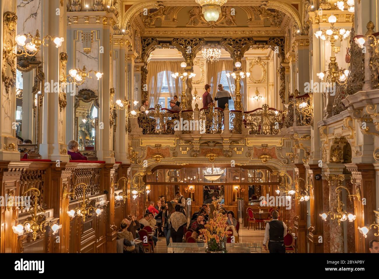 Budapest, Hungary - Feb 09, 2020: Luxury golden hall inside New Stock Photo