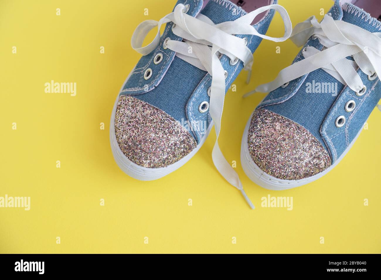 Denim Children S Shoes With Laces On A Yellow Background Kid S Fashion Pair Of Trendy Shiny Child S Sneakers Summer Girls Fashion Boots Copy Space Stock Photo Alamy
