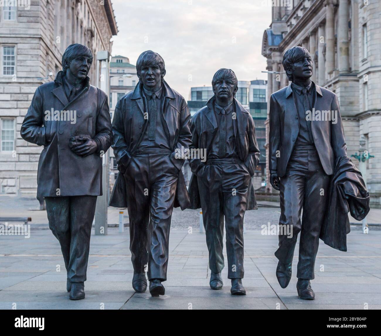 Beatles statue on the Liverpool waterfront seen just after sunrise in February 2016. Stock Photo