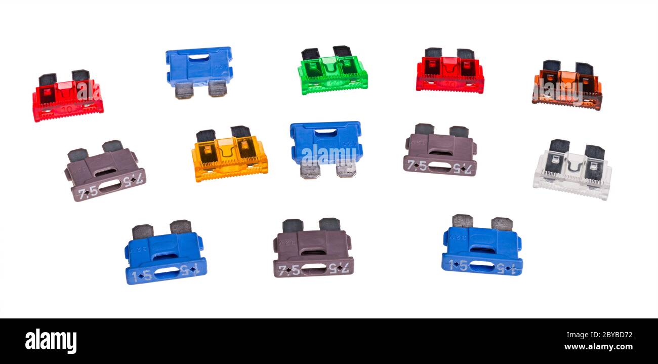 Colored automotive blade type fuses. Collection of current limiters with two metal prongs. Electrical devices for overcurrent protect in cars wiring. Stock Photo