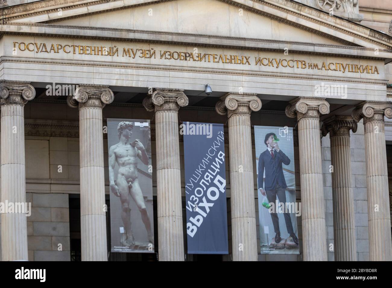 Moscow, Russia. 8th of June, 2020 A banners on the facade of the Museum of Fine Arts named after as A. Pushkin in Moscow's city centre during an the novel coronavirus COVID-19 epidemic in Russia. The photography (right) of the winner of the competition Andrey Bratov is displayed at the entrance to the Pushkin Museum, who created a gallery of images of Michelangelo's 'David' in home self-isolation during the coronavirus epidemic Stock Photo