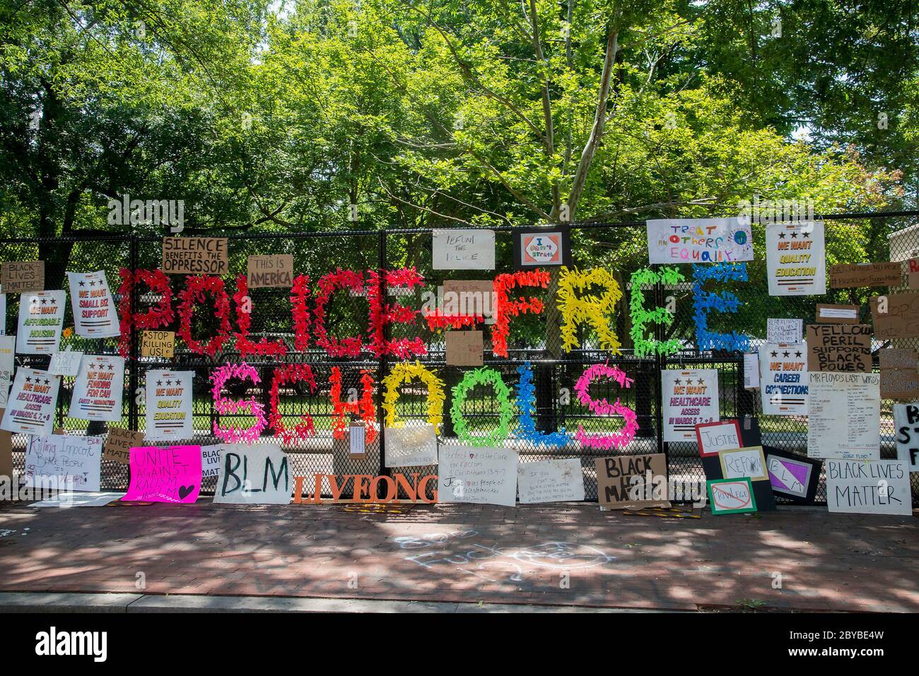 Washington DC, June 9, 2020,USA: Tourists and protestors gather around the sign -laden temporary fences surround Lafayette Park across from the White Stock Photo