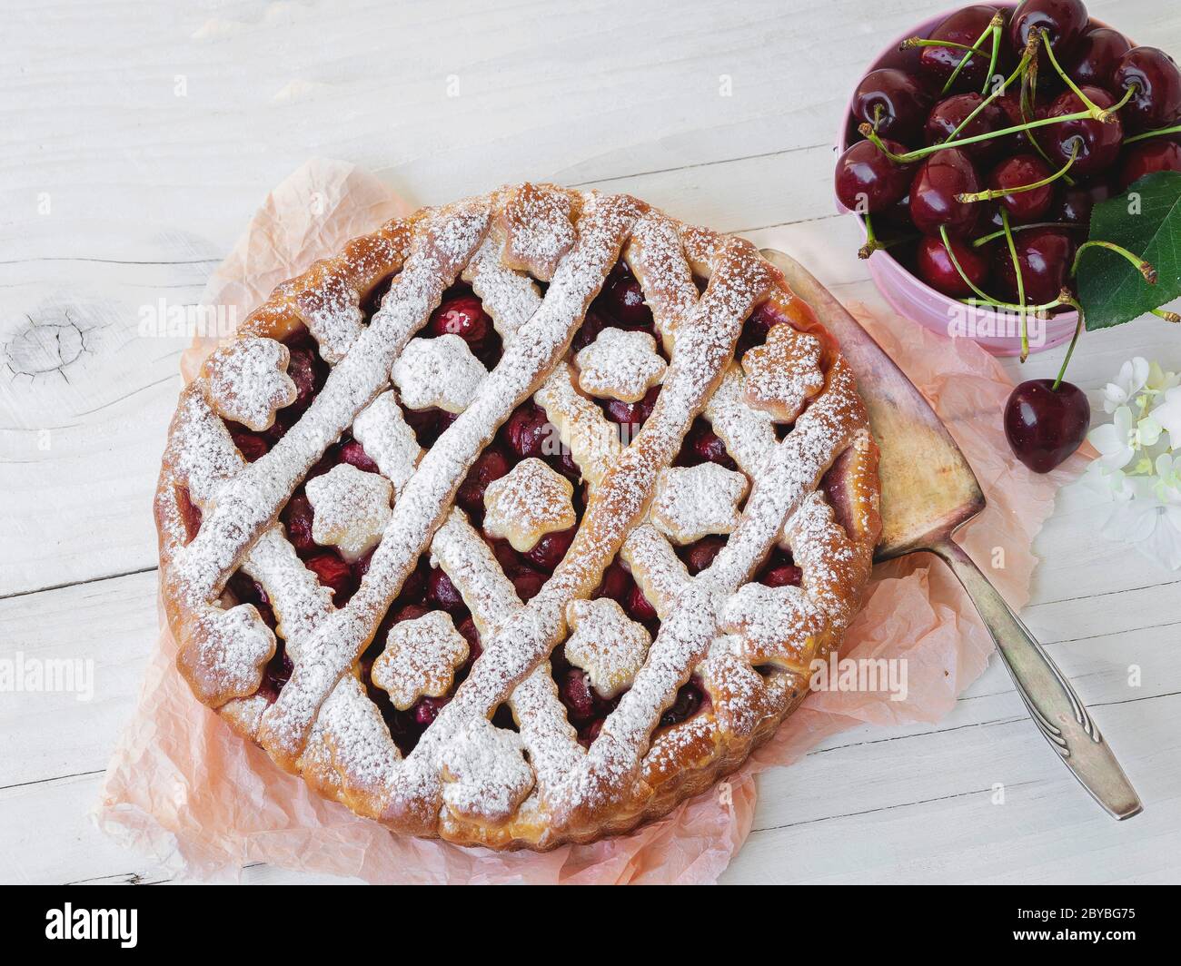 Tasty homemade cherry pie sweet on rustic wooden white background ...